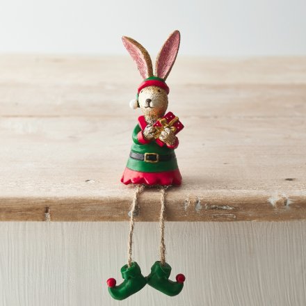 Rabbit dressed as elf sitting decoration