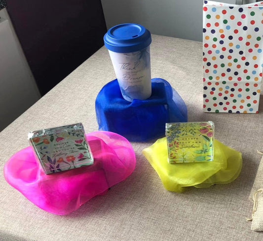 Set of 8 pieces of different colour voile for displays